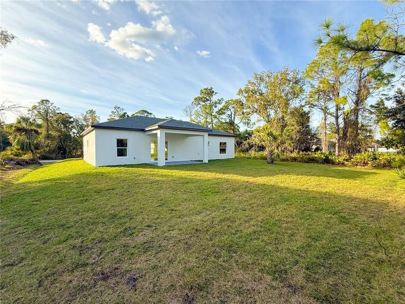 Exterior details and patio area of a home in , North Port (Image 4).