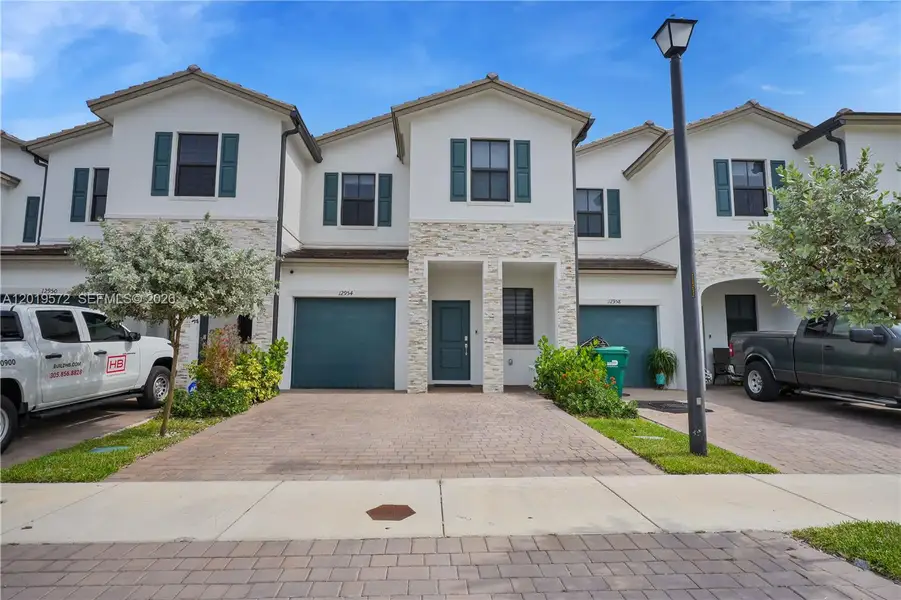 Front exterior of a new home in , Miami, FL, highlighting curb appeal (Image 2). Front exterior of a new home in , Miami, FL, highlighting curb appeal (Image 2).