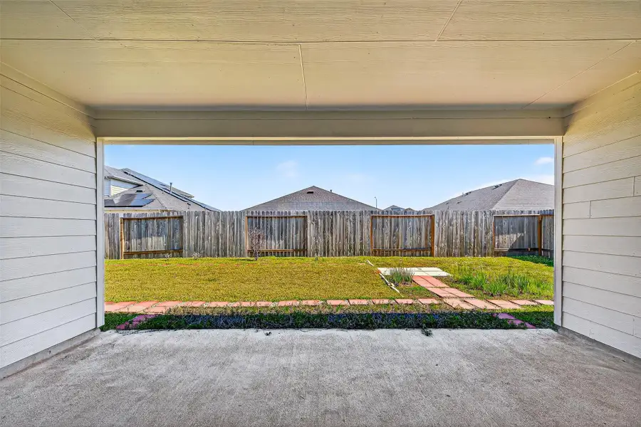 Exterior details and patio area of a home in Windstone on the Prairie, Richmond (Image 1).