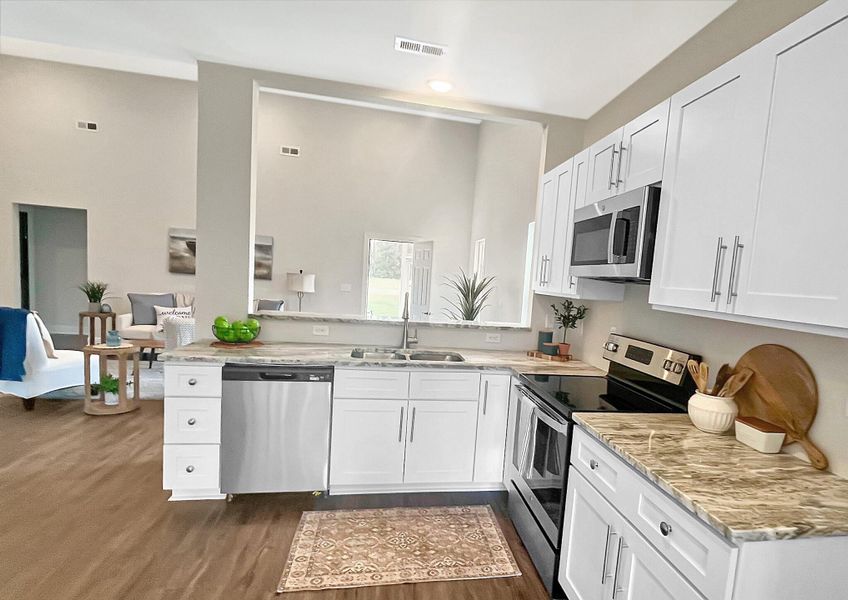 Furnished interior view inside a new home in , St. Stephen (Image 12).