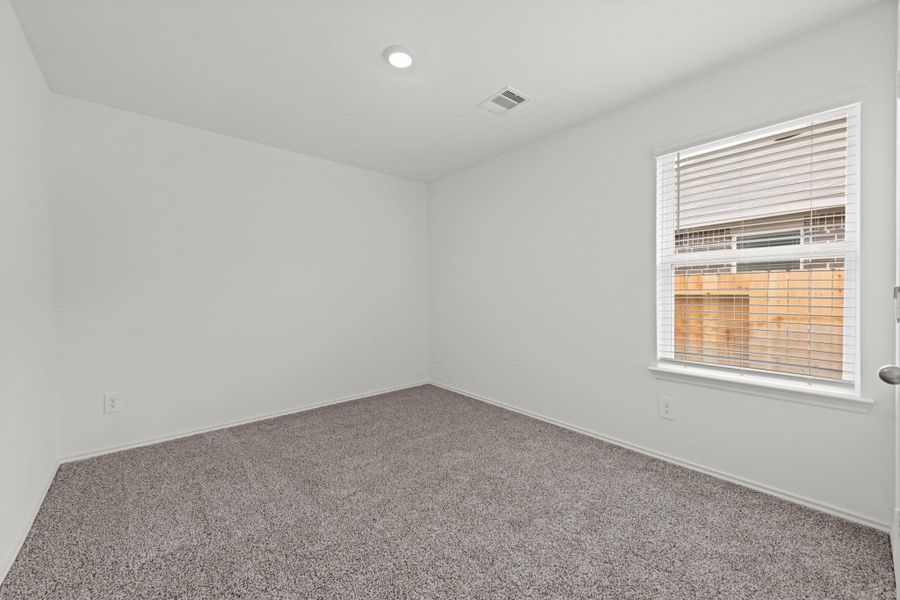 Spacious, unfurnished interior of a new home in Harrington Trails at The Canopies, Splendora (Image 5).