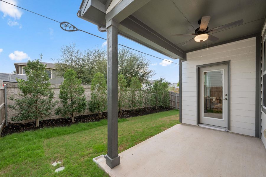 Exterior details and patio area of a home in Sarah's Creek, Pflugerville (Image 22).