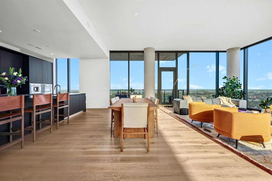 Side view of the kitchen, dining area, and living room.