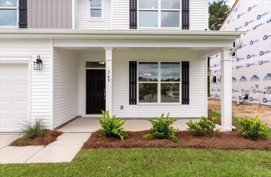 Exterior details and patio area of a home in Oakley Pointe, Moncks Corner (Image 24). Exterior details and patio area of a home in Oakley Pointe, Moncks Corner (Image 24).