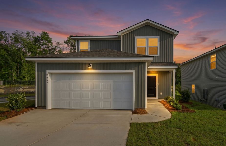 Front exterior of a new home in Grand Arbor, Blythewood, SC, highlighting curb appeal (Image 18). Front exterior of a new home in Grand Arbor, Blythewood, SC, highlighting curb appeal (Image 18).