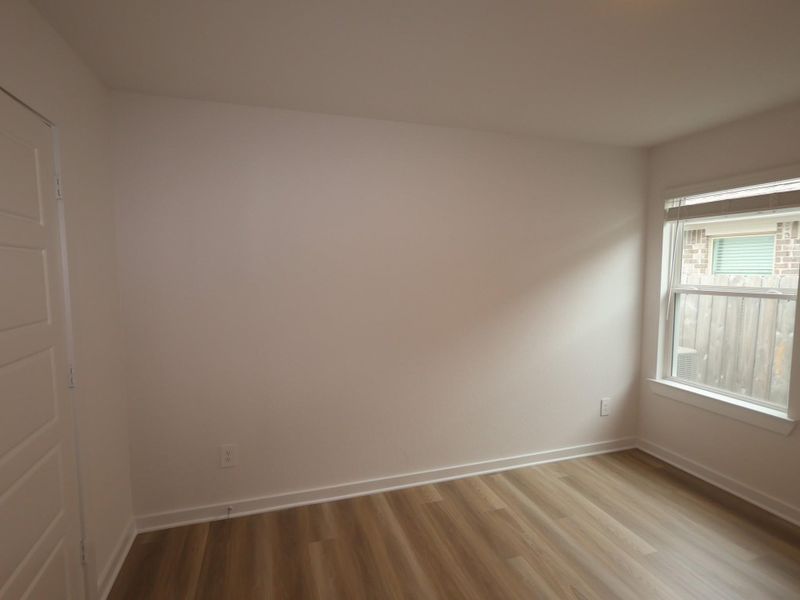 Spacious, unfurnished interior of a new home in Pinewood at Grand Texas, New Caney (Image 17).