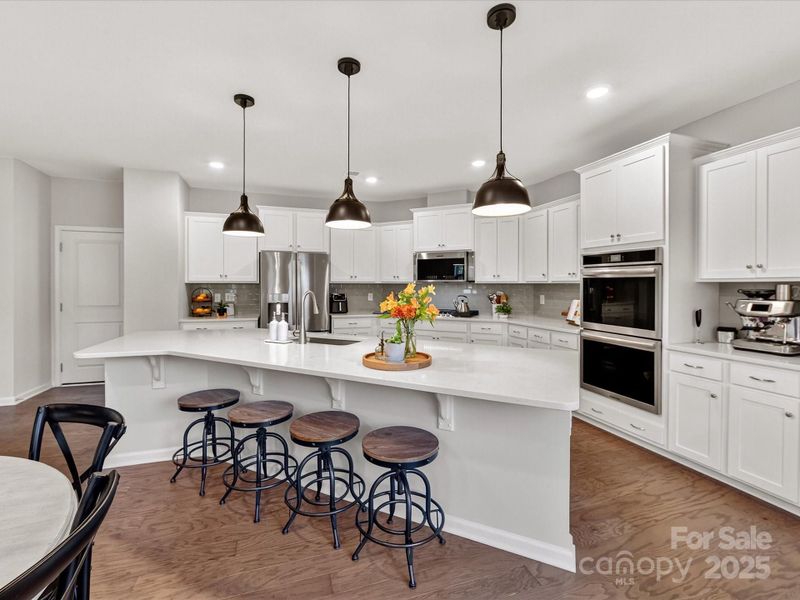 Five Burner Gas Range and Vented Outside Microwave. Single Bowl Sink