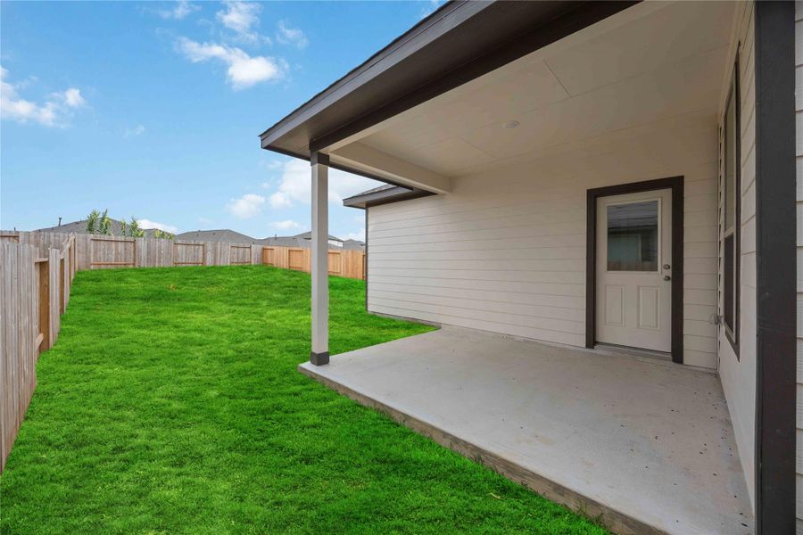 Exterior details and patio area of a home in Bluestem, Brookshire (Image 4). Exterior details and patio area of a home in Bluestem, Brookshire (Image 4).