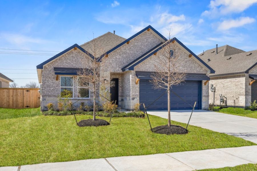 Front exterior of a new home in Ashland, Houston, TX, highlighting curb appeal (Image 18).