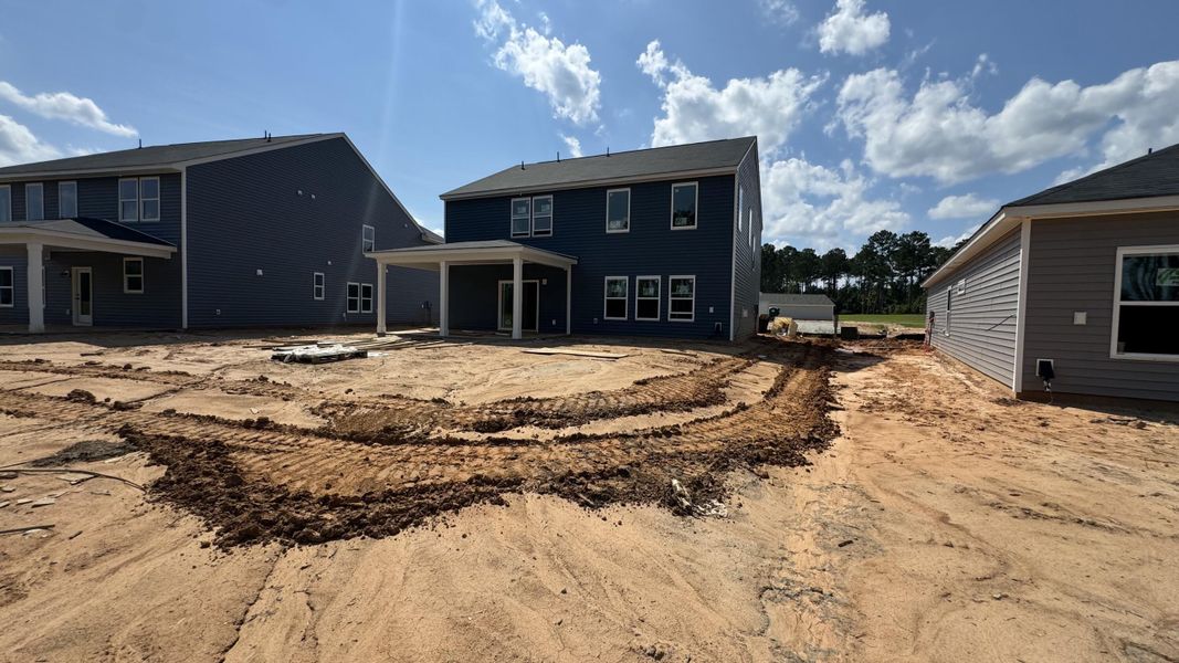Front exterior of a new home in Watson Hill, Summerville, SC, highlighting curb appeal (Image 24).
