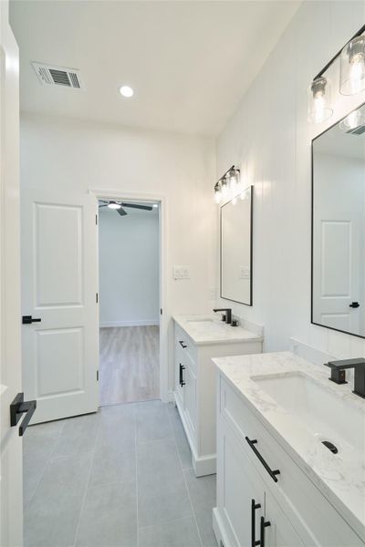 Shared Secondary Bathroom with access from both rooms