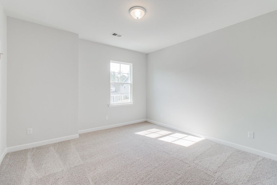 Spacious, unfurnished interior of a new home in Pebble Branch, Chapin (Image 37).