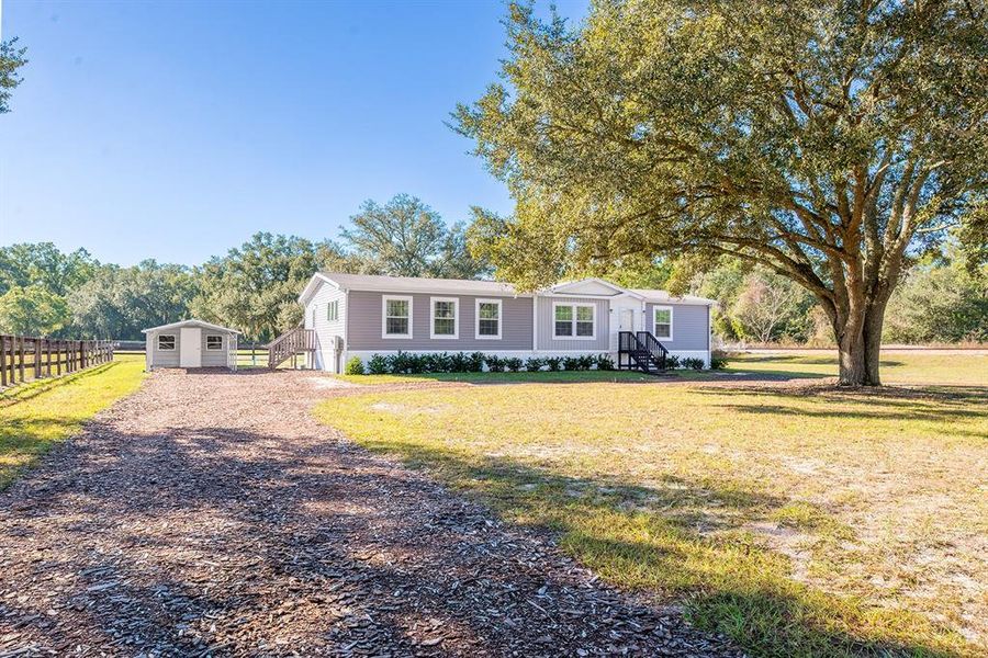 Exterior details and patio area of a home in , Morriston (Image 19).