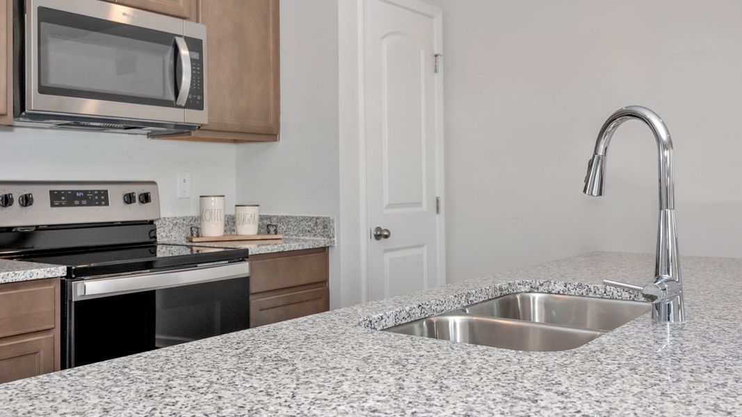 Representative furnished interior of a home built from the Aldridge by D.R. Horton in Bailey Park, Fayetteville (Image 8).