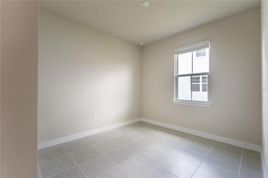 Spacious, unfurnished interior of a new home in The Palms at Venetian Bay, New Smyrna Beach (Image 16).