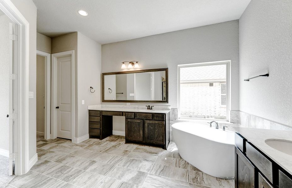 Furnished interior view inside a new home in Bridgeland 60′, Cypress (Image 5).