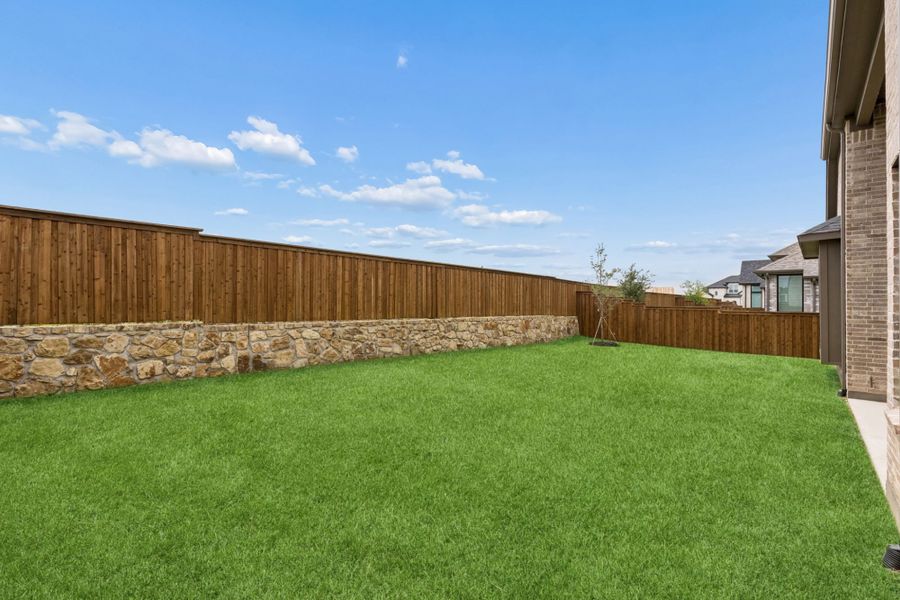Exterior details and patio area of a home in Mosaic – 70′ Lots, Celina (Image 28).