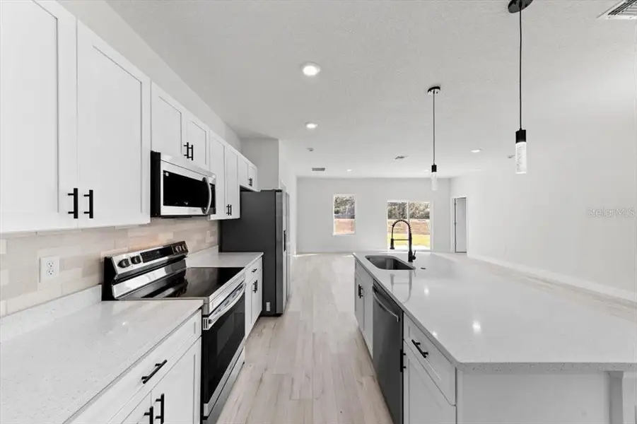 Furnished interior view inside a new home in , Ocala (Image 6).