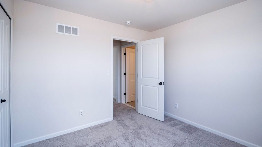 Representative unfurnished interior of a home built from the The Kettering by Norfolk Homes in Preserve at Magnolia Park, Jackson (Image 48).