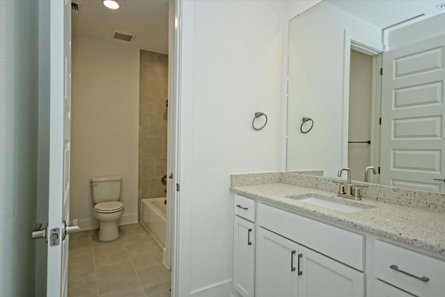Furnished interior view inside a new home in Scofield Farms Estates, Georgetown (Image 6).