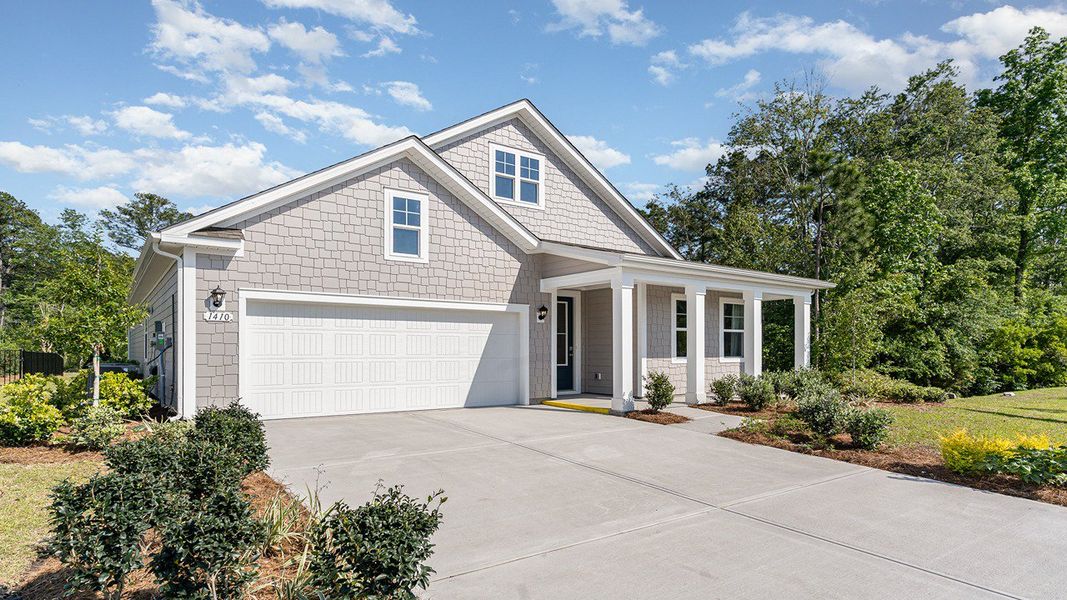 Representative exterior photo of a completed home built from the Darby by D.R. Horton in Heron Pointe, Myrtle Beach, SC (Image 25). Representative exterior photo of a completed home built from the Darby by D.R. Horton in Heron Pointe, Myrtle Beach, SC (Image 25).