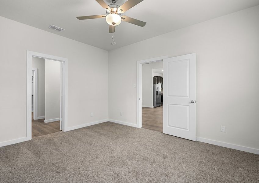 The master suite has a large bedroom, ensuite bathroom and a walk-in closet.