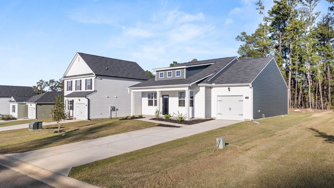 Front exterior of a new home in Bellemeade Landing, Augusta, GA, highlighting curb appeal (Image 2). Front exterior of a new home in Bellemeade Landing, Augusta, GA, highlighting curb appeal (Image 2).