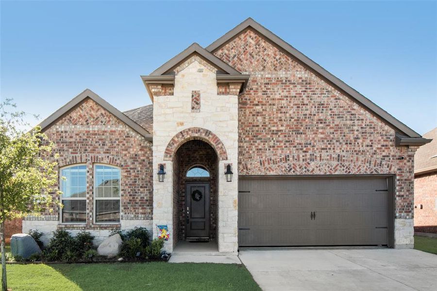 Front exterior of a new home in , Aubrey, TX, highlighting curb appeal (Image 21).