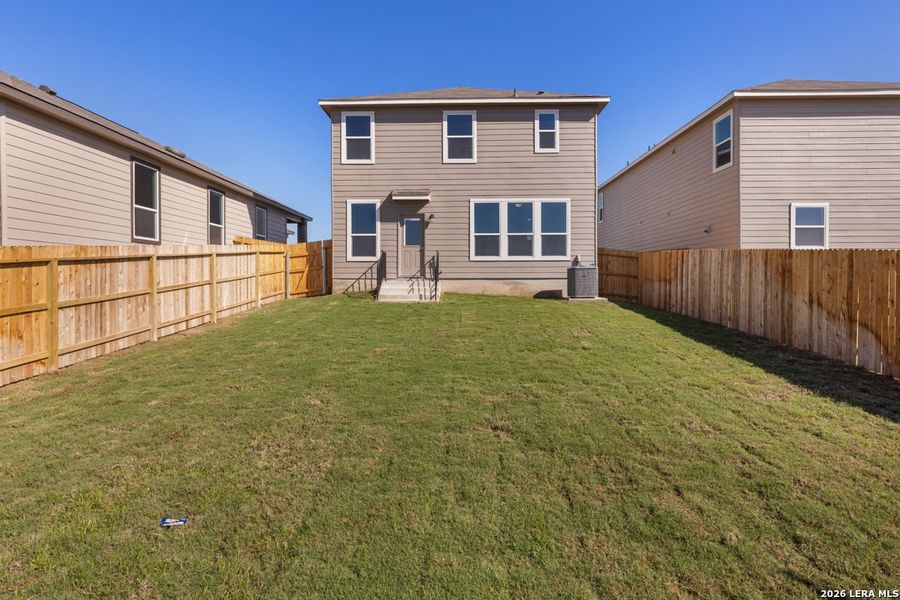 Exterior details and patio area of a home in Knox Ridge, Converse (Image 21).