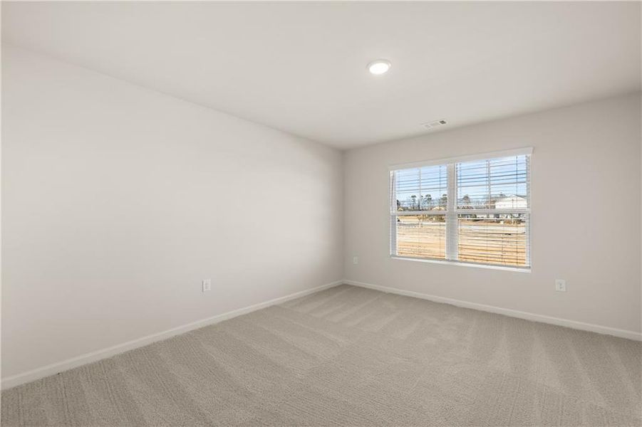 Spacious, unfurnished interior of a new home in Lake Carlton, Loganville (Image 24).