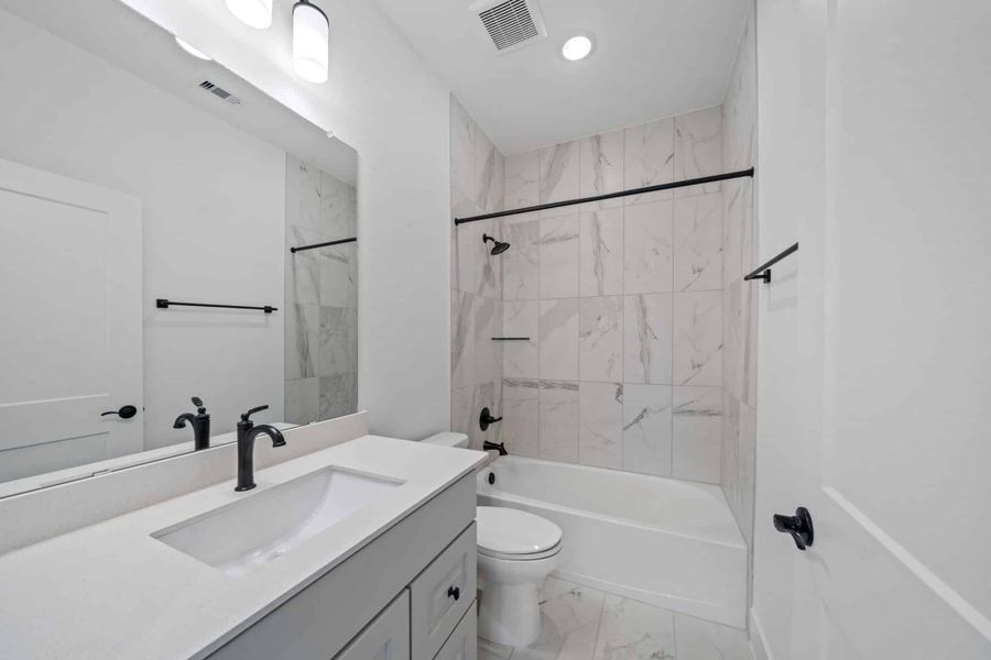 Representative furnished interior of a home built from the Waterloo – 60′ Lot by Chesmar Homes in Lakes of Cane Island, Katy (Image 9).