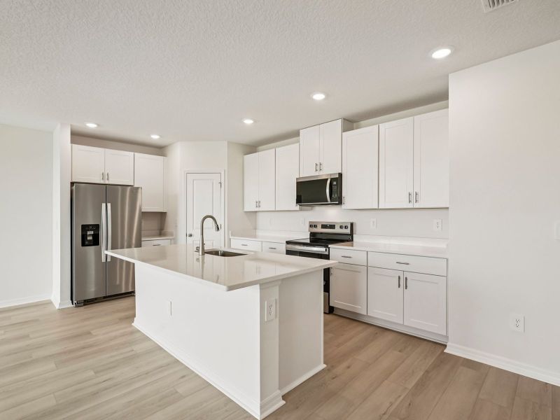 Furnished interior view inside a new home in Magnolia Bay - Classic Series, Nokomis (Image 3).