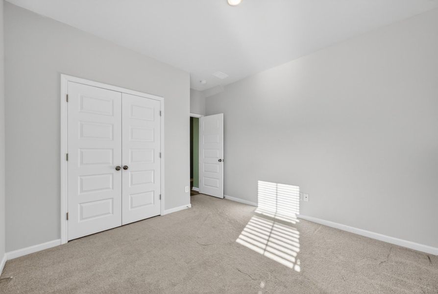 Spacious, unfurnished interior of a new home in Azalea Ridge at Summers Corner: Arbor Collection, Summerville (Image 29).