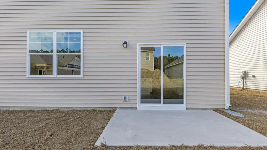 Representative exterior photo of a completed home built from the HAYDEN by D.R. Horton in Sidbury Station, Castle Hayne, NC (Image 20).