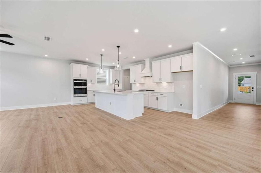 Spacious, unfurnished interior of a new home in The Paddocks at Doc Hughes, Buford (Image 29).