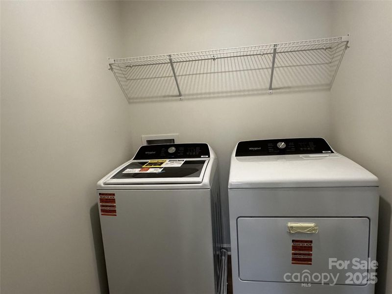 Laundry room on the second floor, washer and dryer are included in this home!