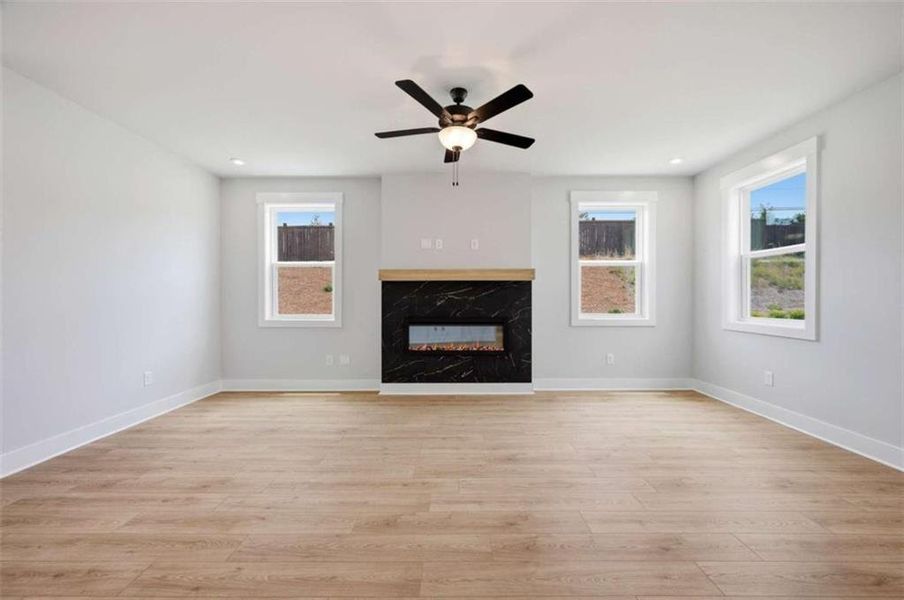 Spacious, unfurnished interior of a new home in The Paddocks at Doc Hughes, Buford (Image 39).