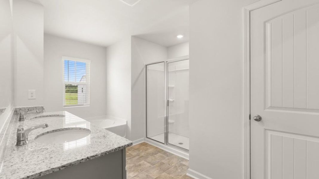 Furnished interior view inside a new home in Oaks at Cedar Grove, Fairburn (Image 3).