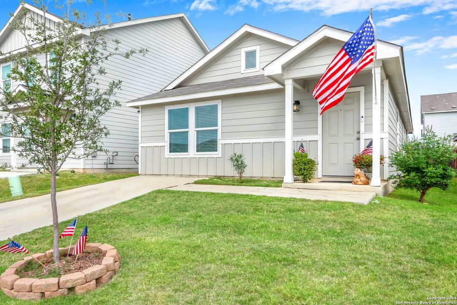 Front exterior of a new home in , San Antonio, TX, highlighting curb appeal (Image 15).