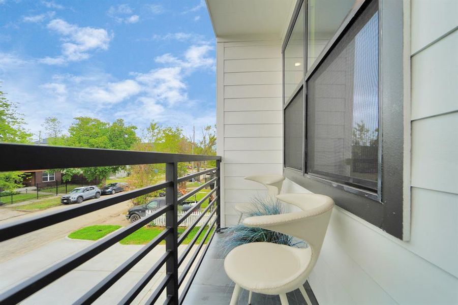 Private balcony in primary bedroom