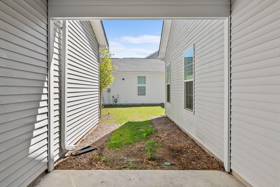 Exterior details and patio area of a home in , Summerville (Image 20).