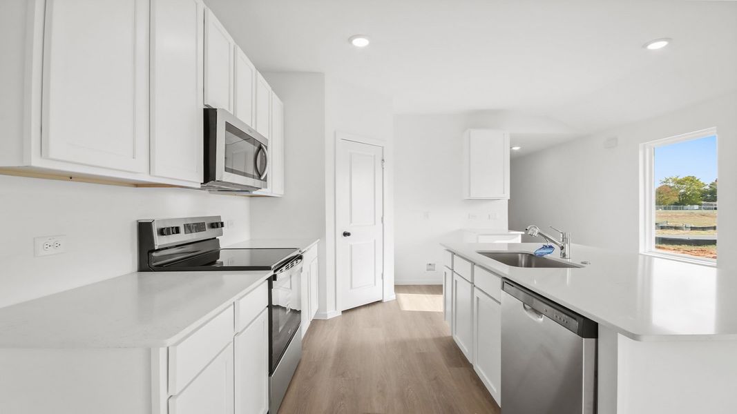 Representative furnished interior of a home built from the Amber by D.R. Horton in Lake Conroe Cove, Willis (Image 7). Representative furnished interior of a home built from the Amber by D.R. Horton in Lake Conroe Cove, Willis (Image 7).