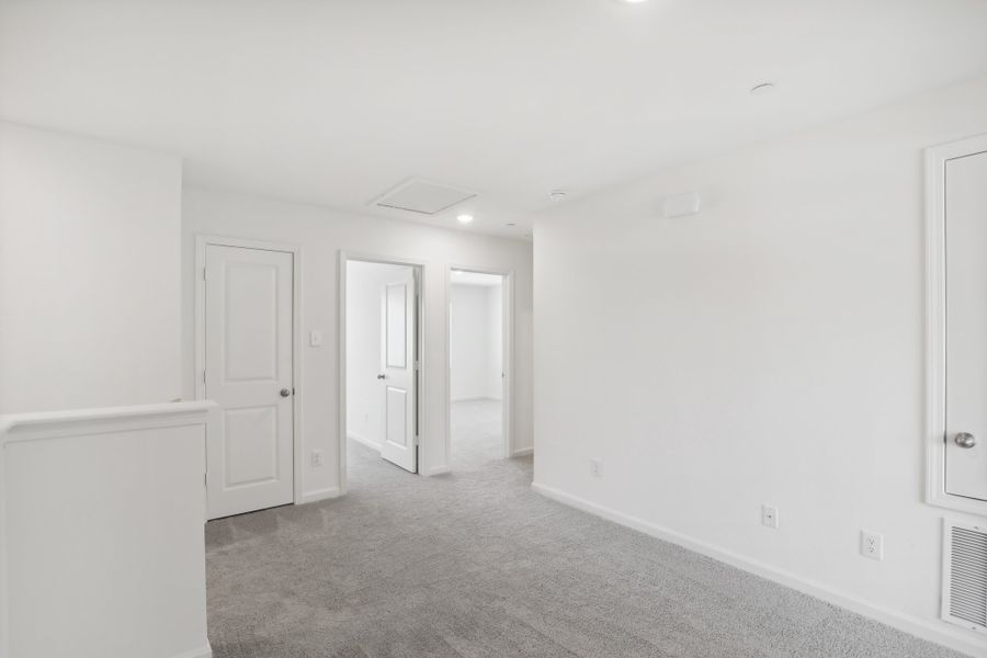 Representative unfurnished interior of a home built from the Orbit by Starlight Homes in Coyote Meadows, Anna (Image 18). Representative unfurnished interior of a home built from the Orbit by Starlight Homes in Coyote Meadows, Anna (Image 18).