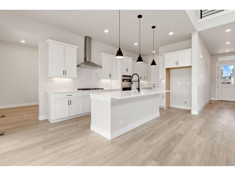 Furnished interior view inside a new home in RainDance, Windsor (Image 3).