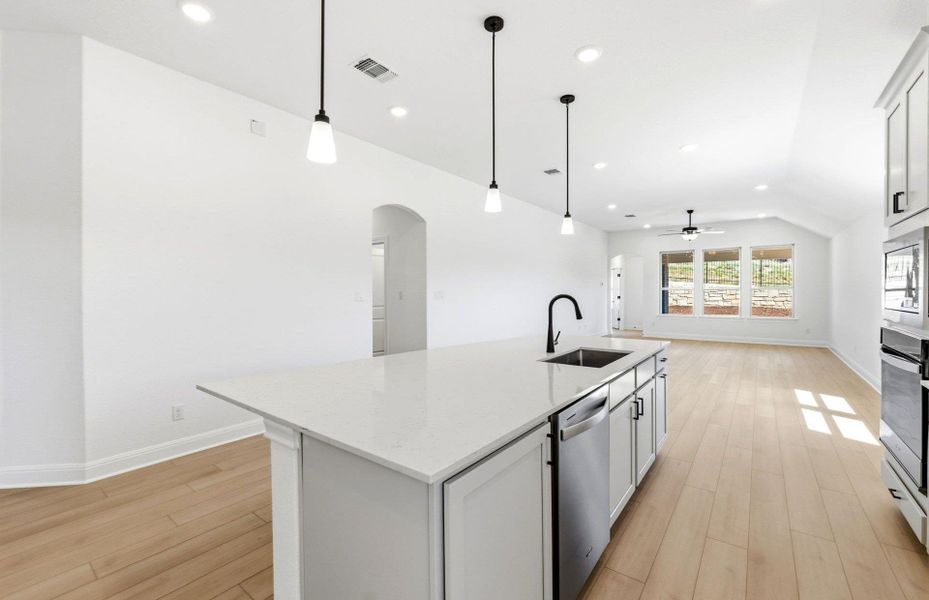 Furnished interior view inside a new home in West Cypress Hills, Spicewood (Image 11).