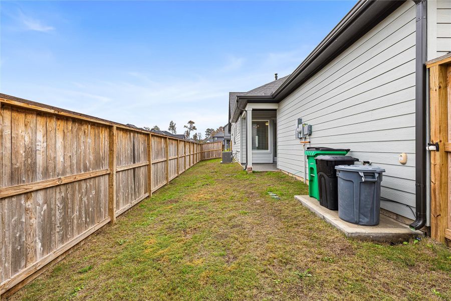 Exterior details and patio area of a home in , Humble (Image 28).
