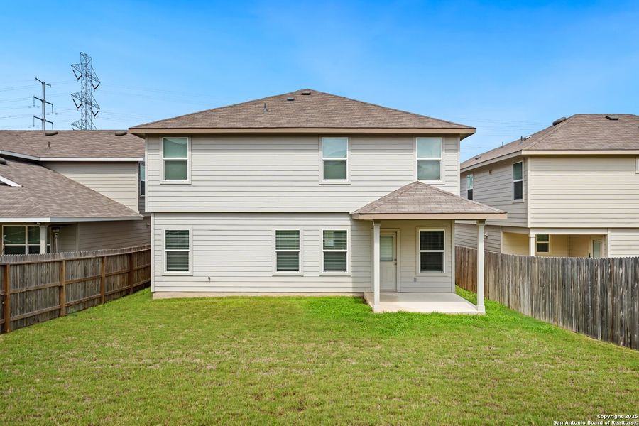 Front exterior of a new home in Laurel Vistas, San Antonio, TX, highlighting curb appeal (Image 21).