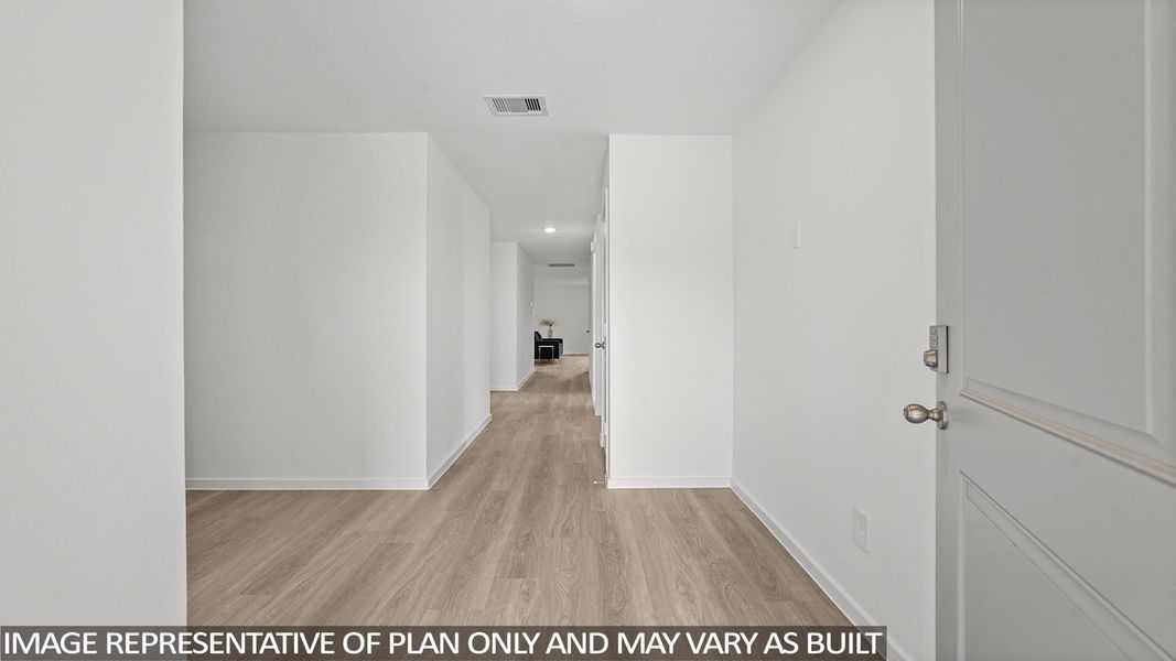 Spacious, unfurnished interior of a new home in Sunterra, Katy (Image 12).