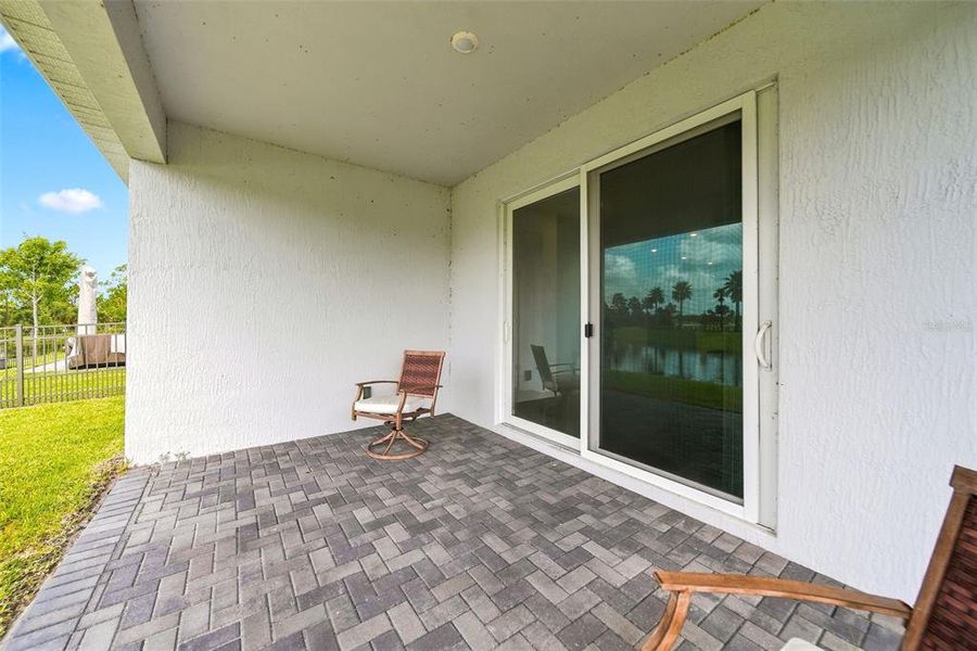 Exterior details and patio area of a home in The Timbers at Everlands, Palm Bay (Image 29).