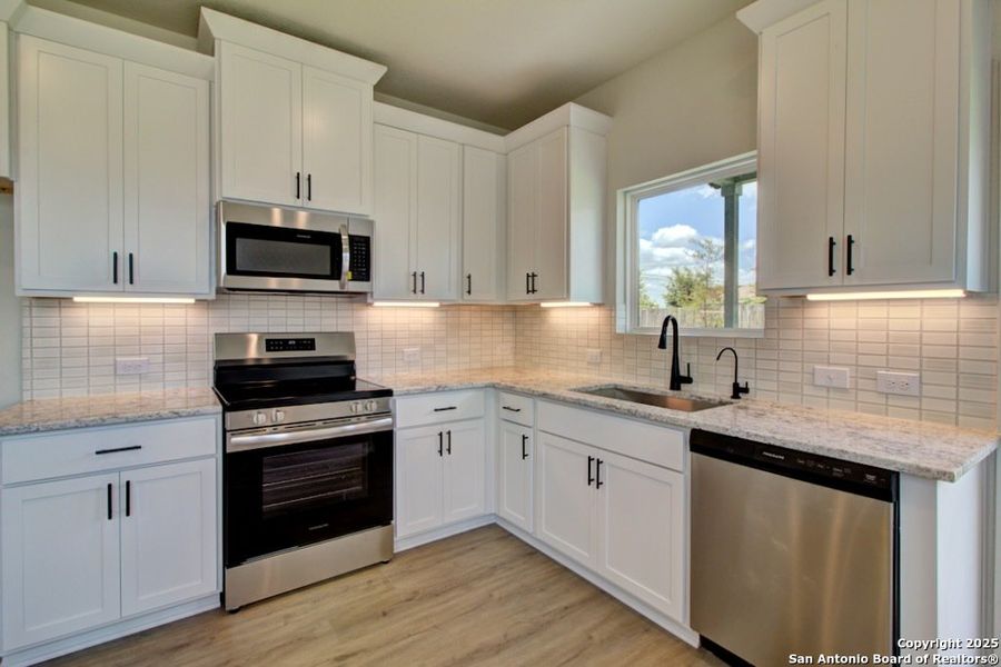 Furnished interior view inside a new home in Casinas at Gruene, New Braunfels (Image 5).